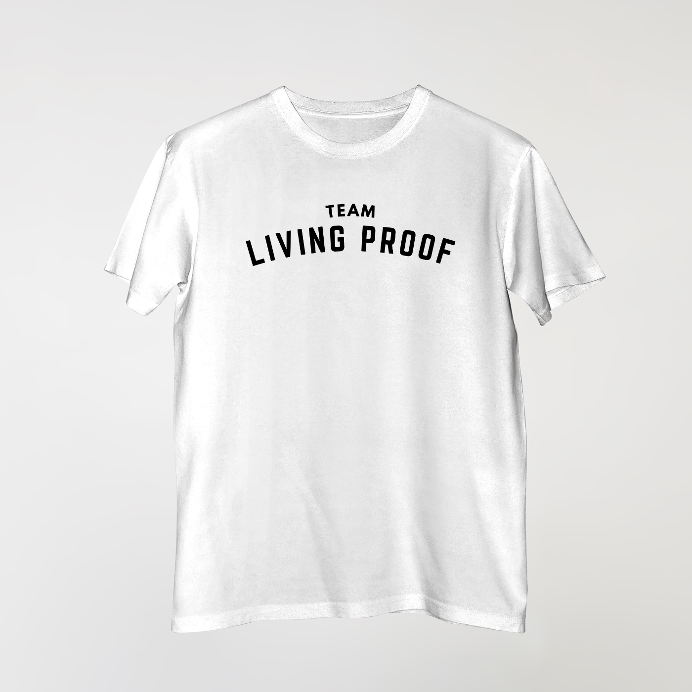 TEAM LIVING PROOF CURVED LOGO TEE