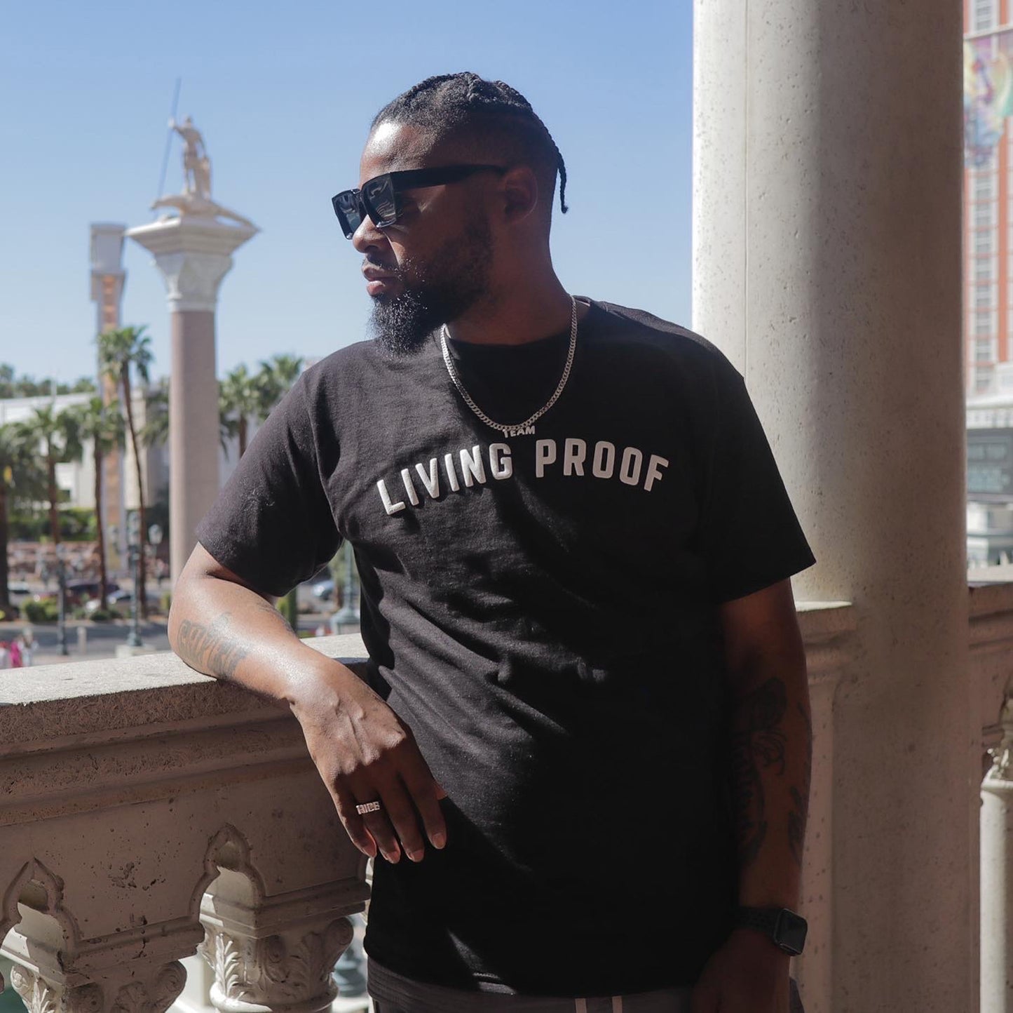 TEAM LIVING PROOF CURVED LOGO TEE